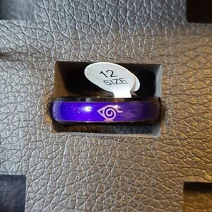 Blue sparkle Naruto ring, stainless steel, mood changing resin. Sm imperfection.
